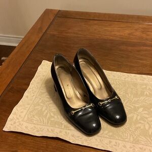 Vero Cuoio Black Pumps with Gold Accents